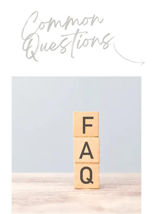 Blocks spelling "FAQ" on a wooden surface with a soft gray background, representing common questions related to the Love2Sugar Advanced Body Sugaring Bootcamp.