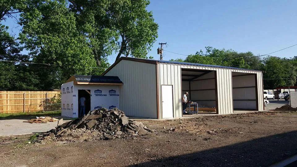 Small metal shop building with concrete slab