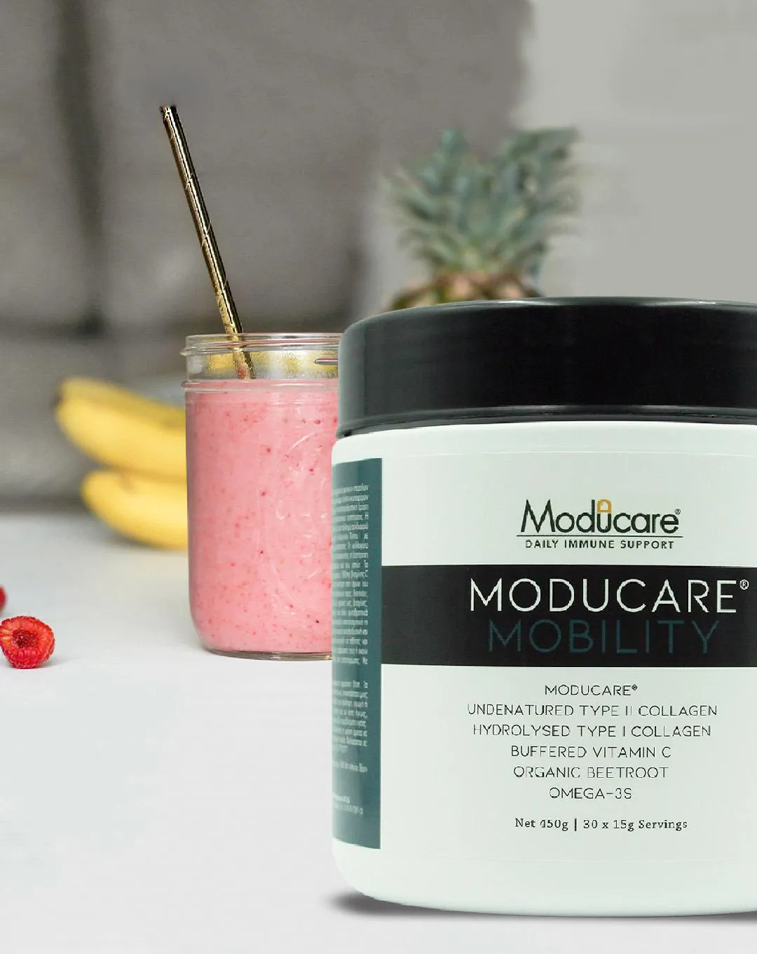 3 glass bottles on brown wooden table