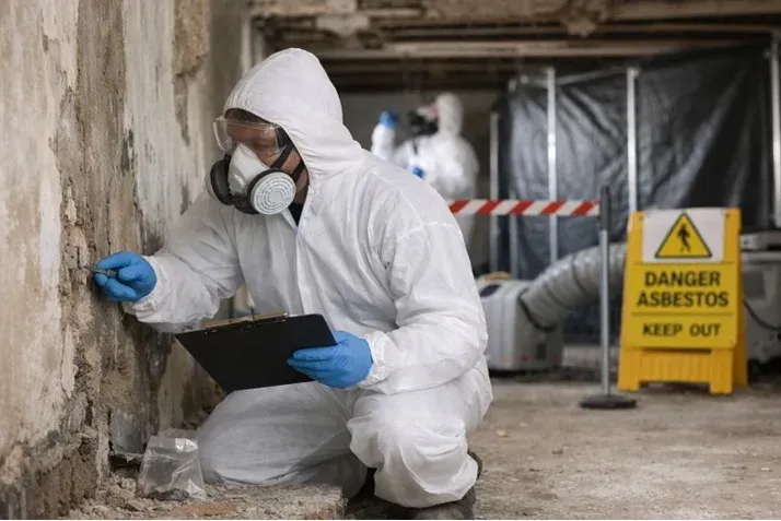 Clean Myrtle Beach asbestos removal site with safety barriers, sealed containment, and organized equipment showing safety and precision