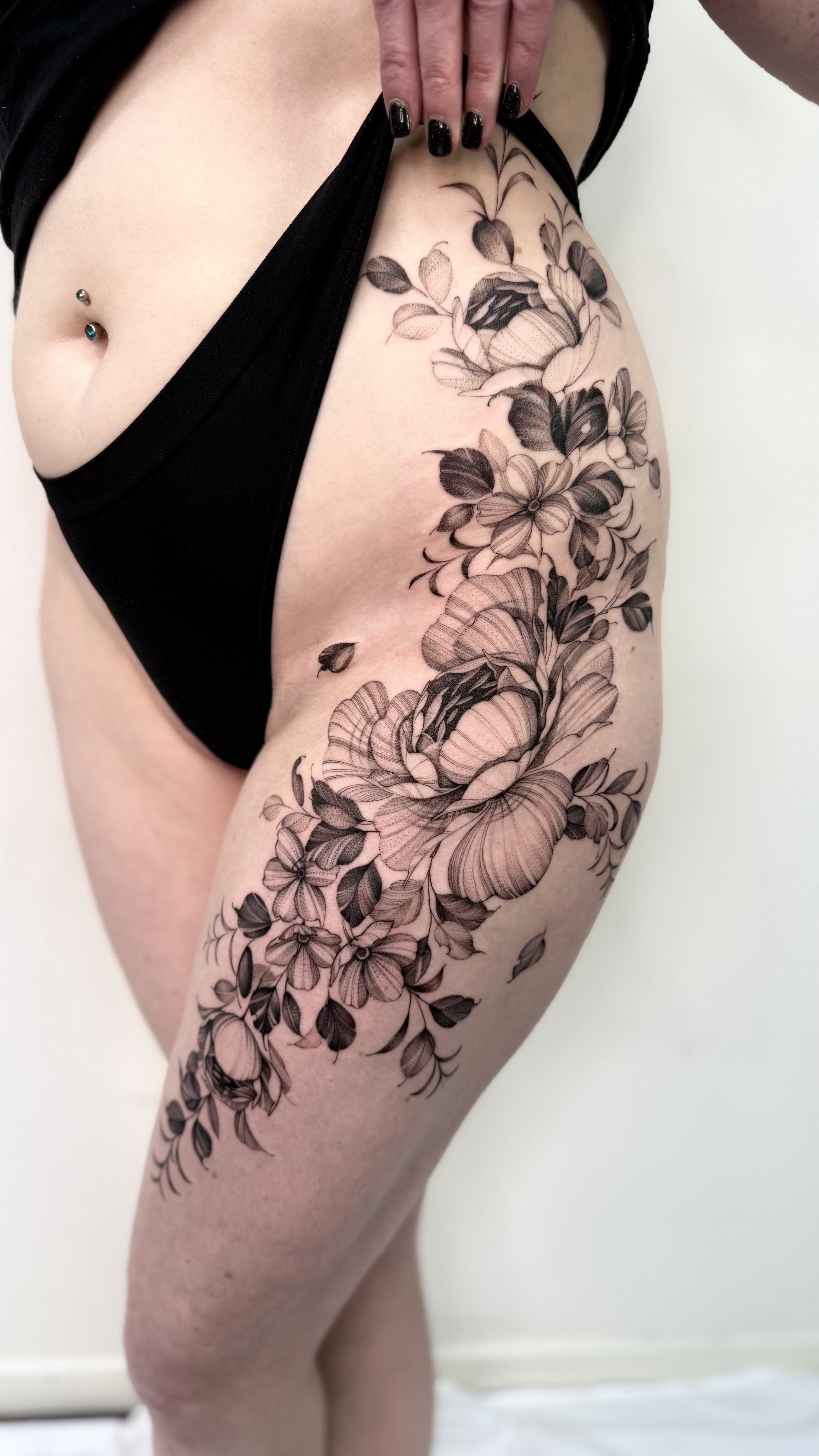 person with tattoo on right arm