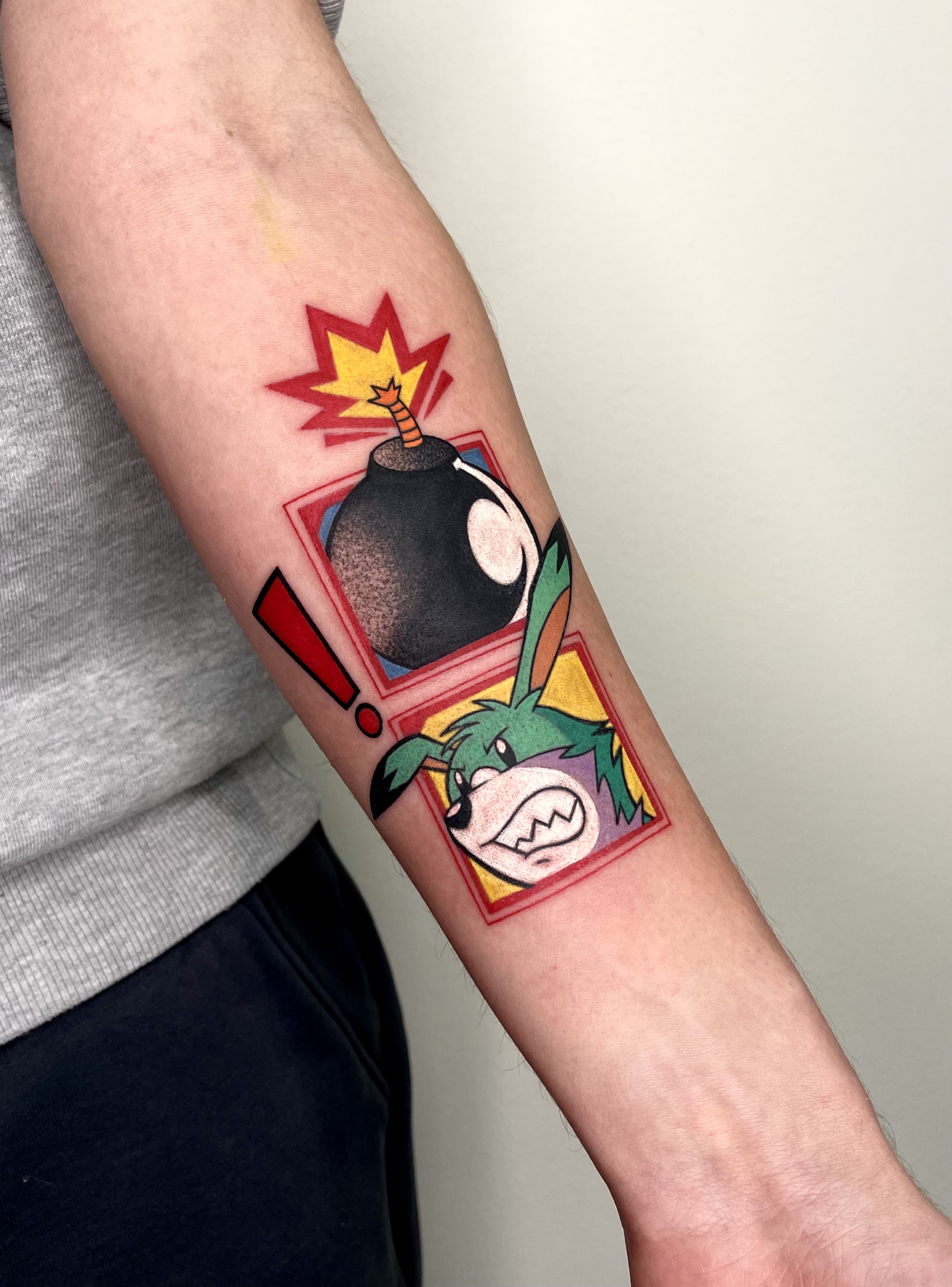 person in blue denim shorts and white nike sneakers standing on gray concrete floor