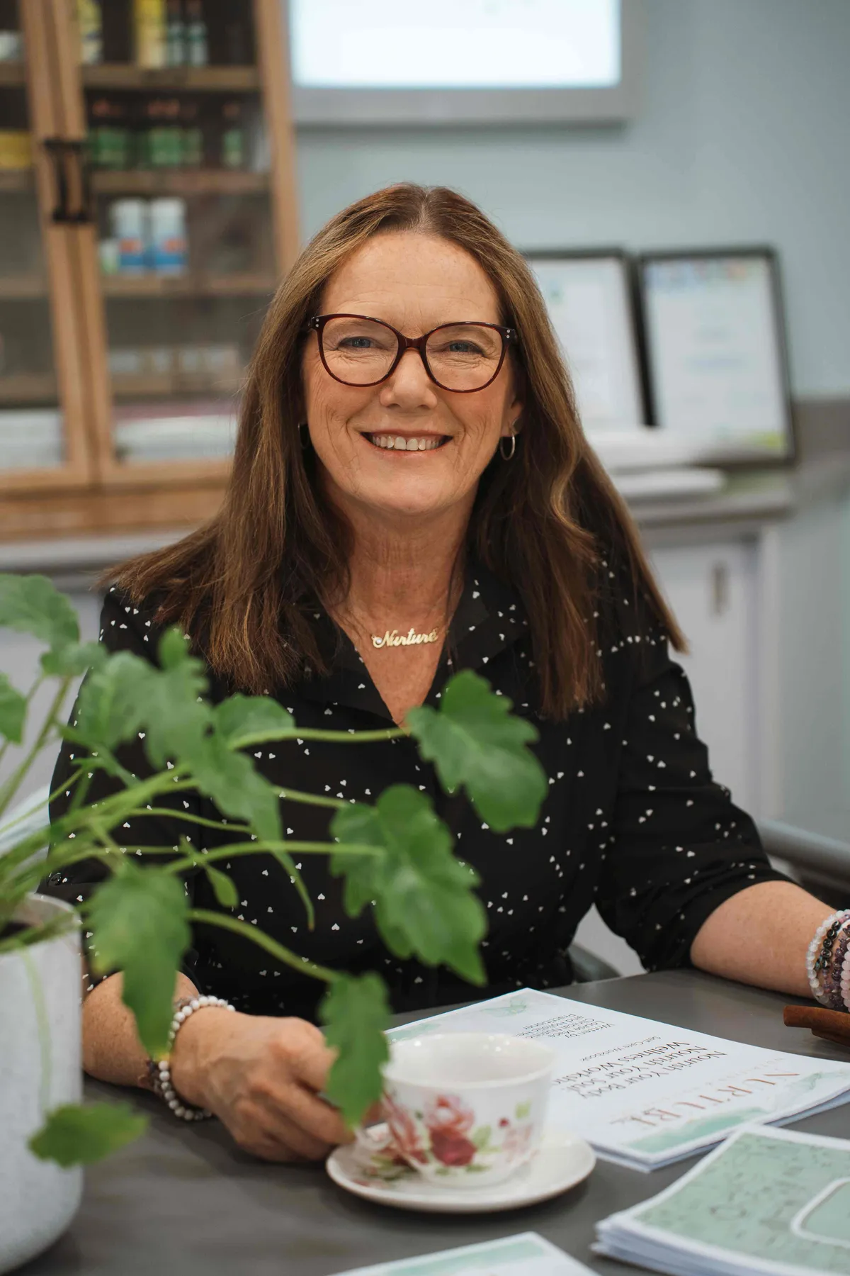Portrait of Louise Mace smiling in her clinic
