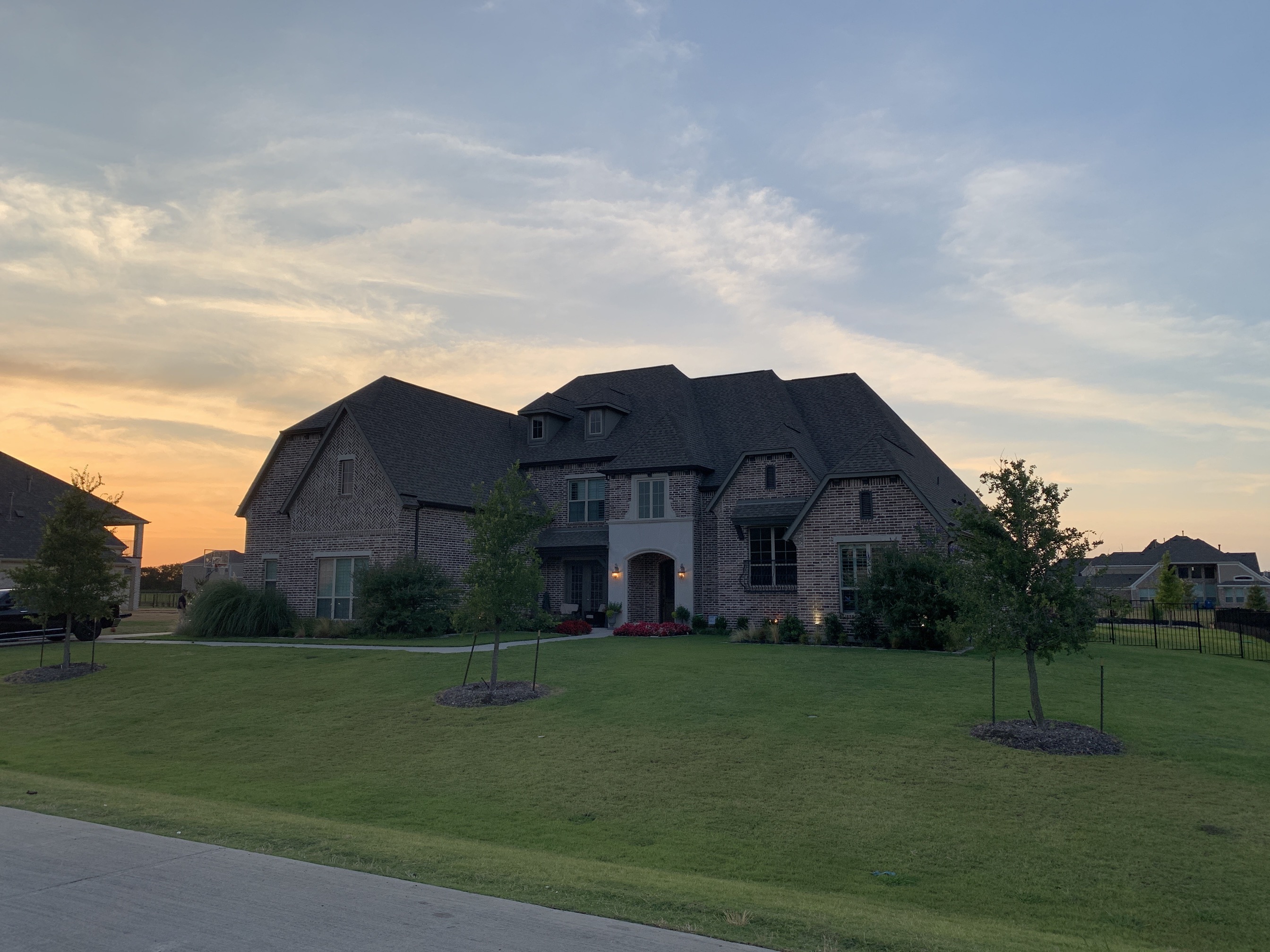 Custom home asphalt shingle roofing project in Oklahoma City by local roofing contractor 123 Remodeling LLC