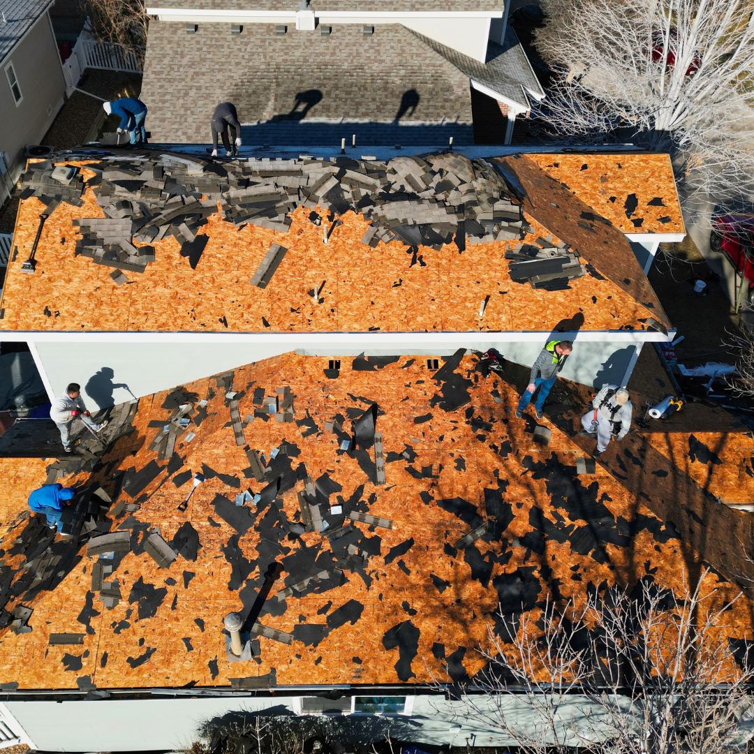 Residential roof tear-off process during full roof replacement