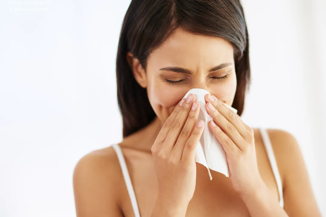 clear glass bottle with red lid