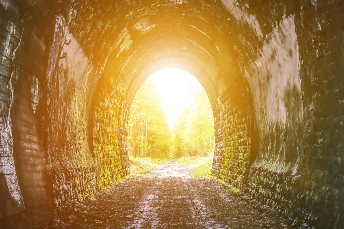 A tunnel with a bright light at the end, signifying the support of probate administration services.