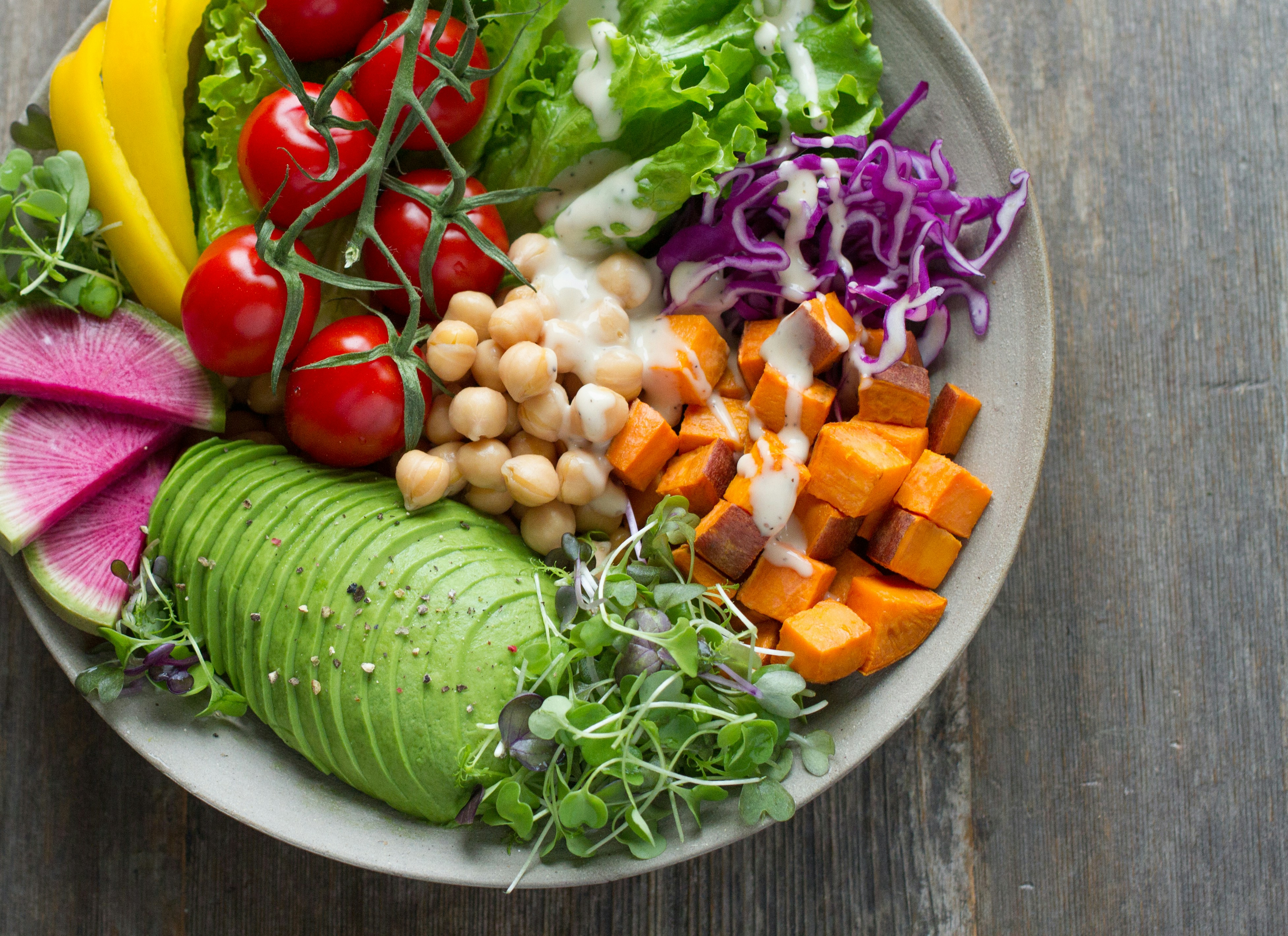 sliced watermelon and mango on plate with fork