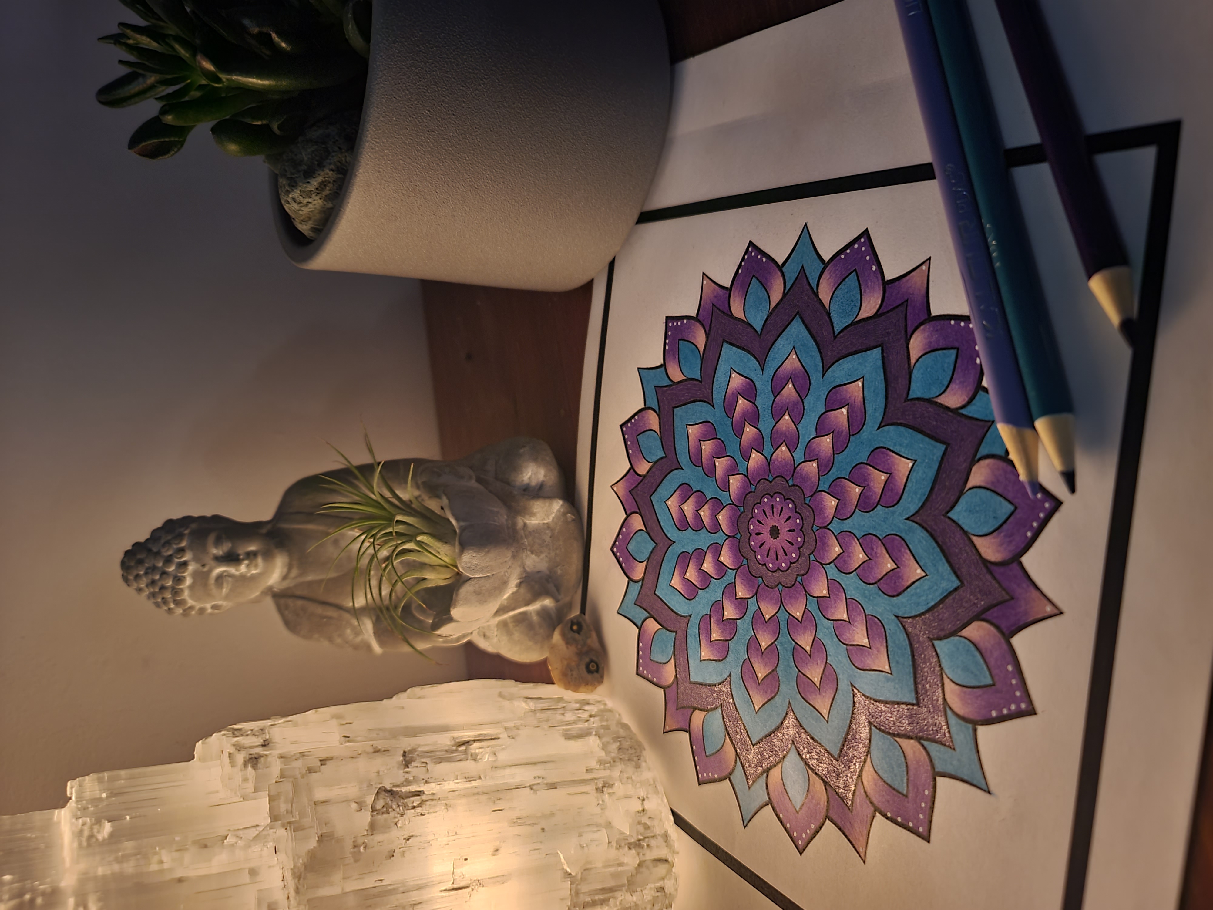 Close-up of hands coloring a detailed mandala with vibrant pencils, soft focus, gentle morning light, and a calming background of art supplies and a steaming herbal tea.