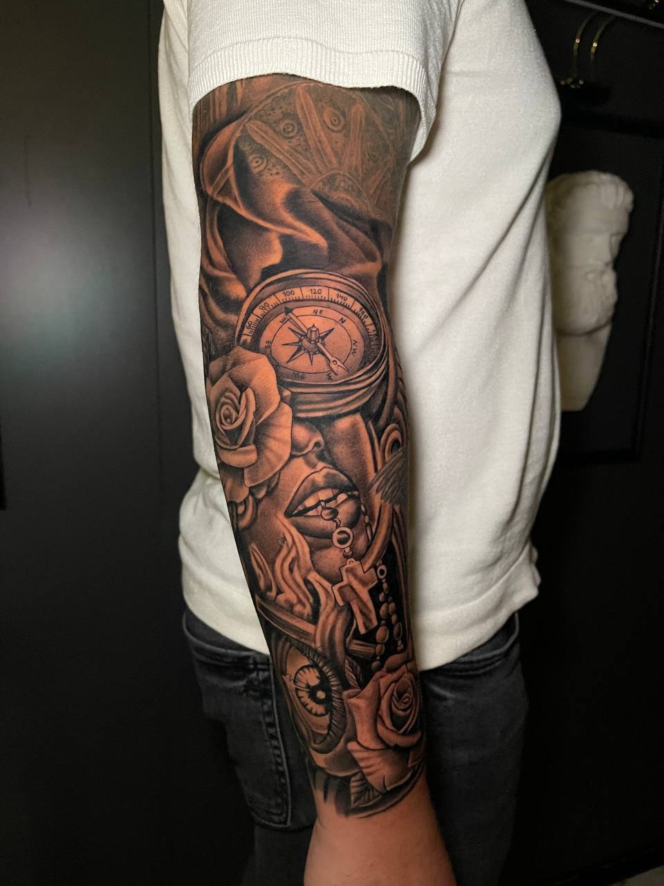 person with tattoo on right arm
