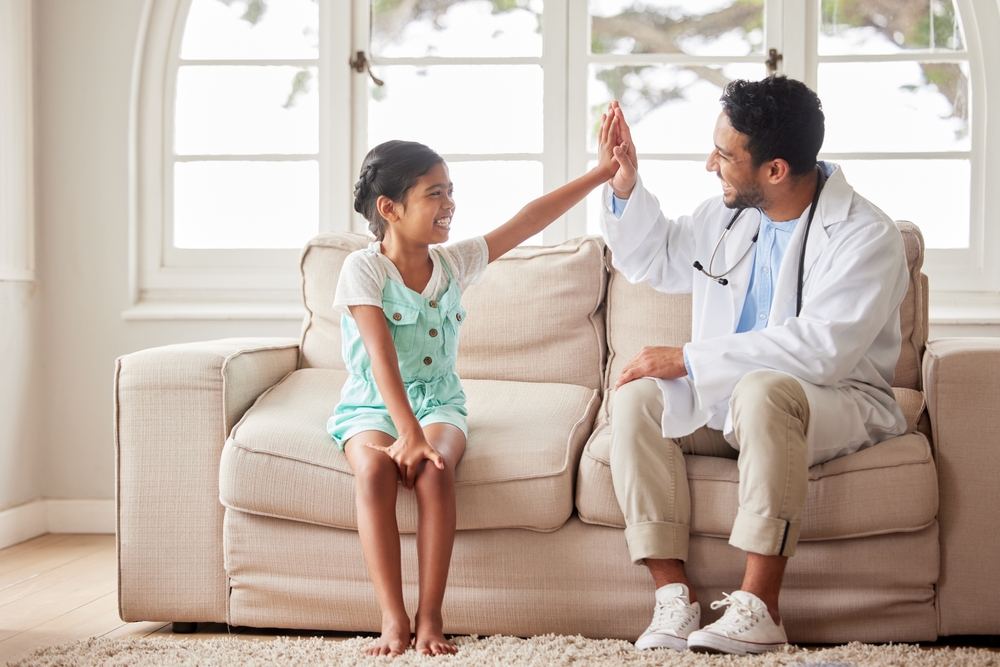 Doctor and child Home Health Visit High Five