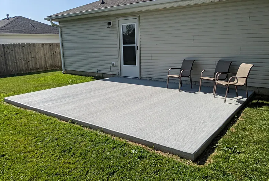Freshly finished concrete patio attached to the back of a home in Warrensville Heights, Ohio.