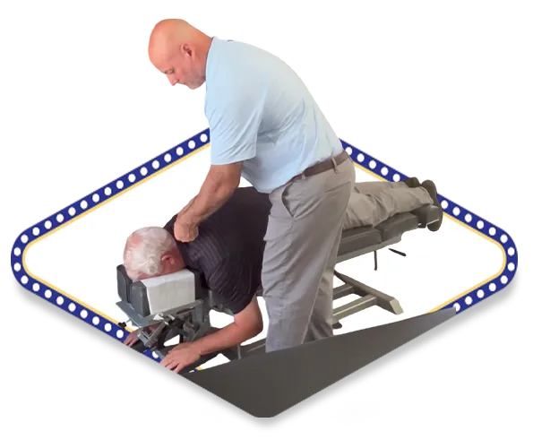 Dr. Dale Kimberlin providing specialized TMJ and jaw disorder chiropractic adjustment treatment for male patient at Kimberlin Chiropractic Health Systems in Ankeny Iowa.