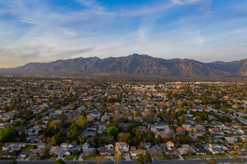 Suburban neighborhood in Azusa, California with mountains in the background