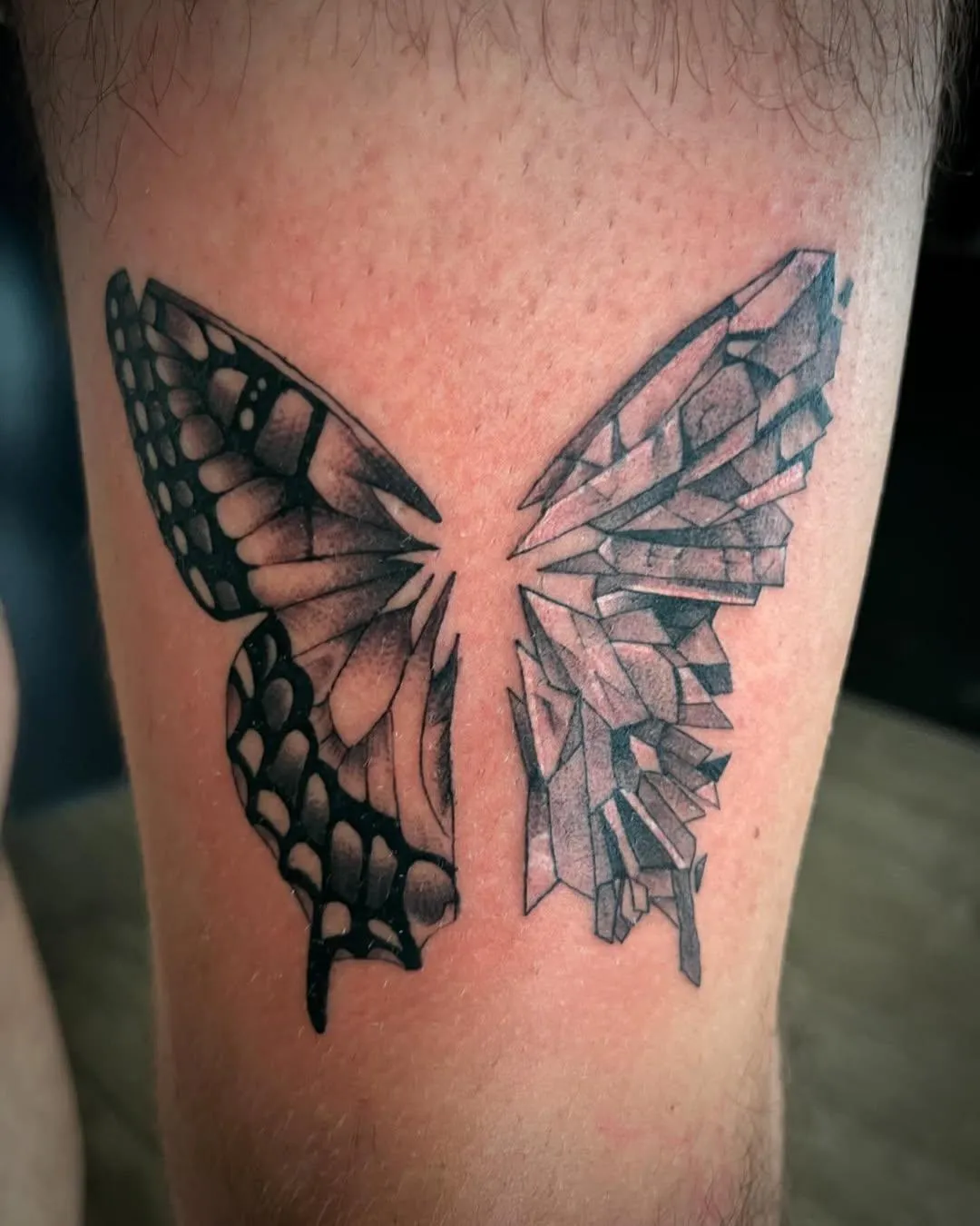 person with tattoo on right arm