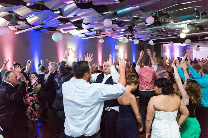 Guests dancing at a wedding at Metropolis Resort