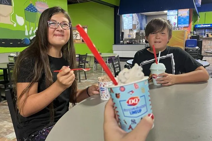 Kids eating Blizzards and Misty Freezes from Dairy Queen in Action City