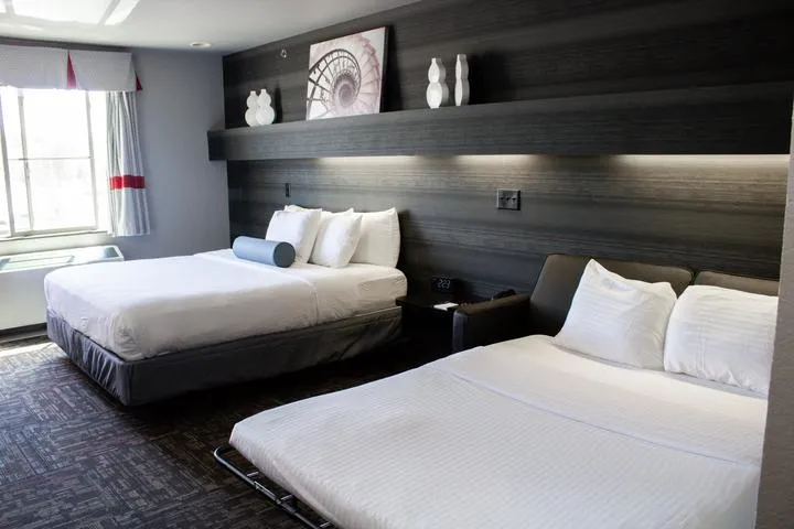 Beds in the Superior King Room at Metropolis Resort