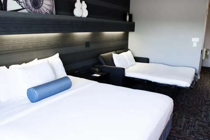 Beds in the Superior King Room at Metropolis Resort