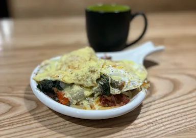 An egg skillet and coffee from City Eats in Action City