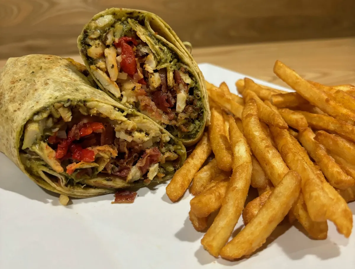 A chicken wrap and french fries from City Eats in Action City