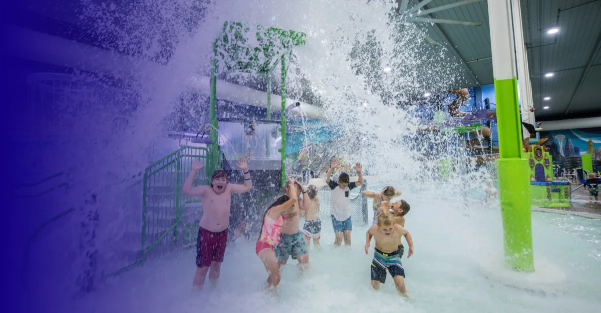 Kids playing at the indoor aquatic playground in Chaos Water Park