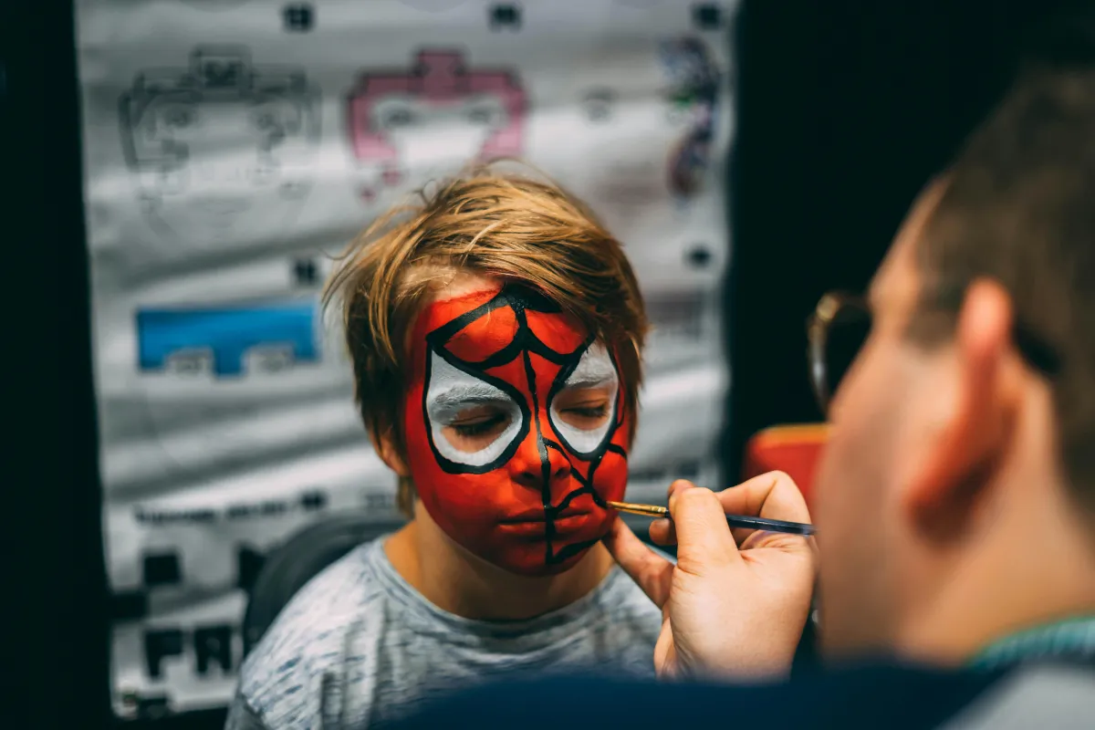 A kid getting his face painted