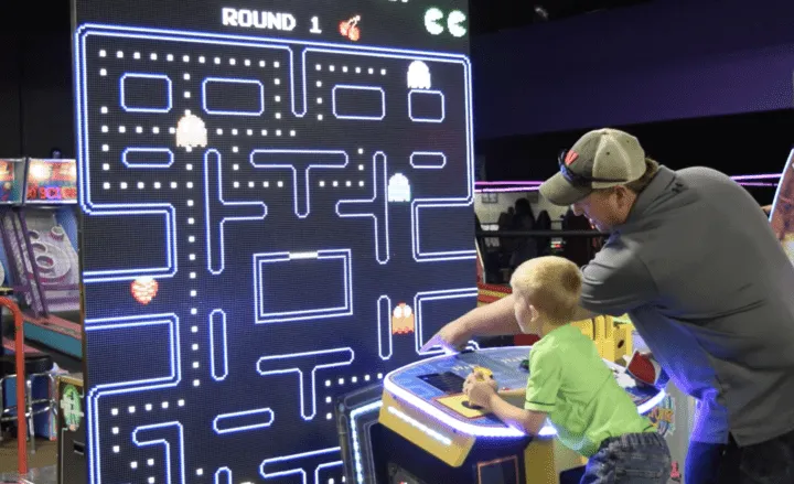 Guests playing World's Largest Pac-Man in Action City