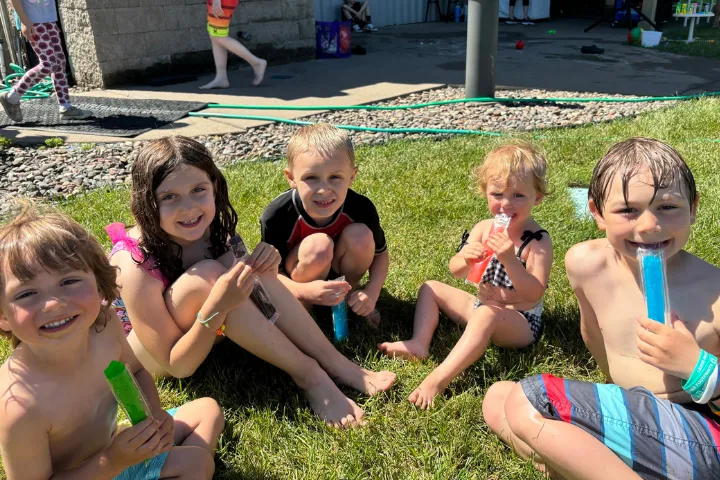 Kids playing in foam in Chaos Water Park's backyard