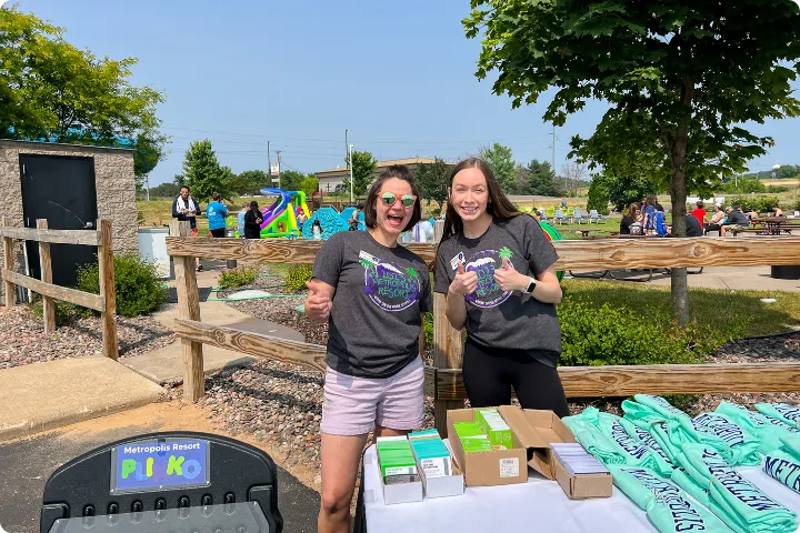 Action City employees giving out prizes in Chaos Water Park's backyard