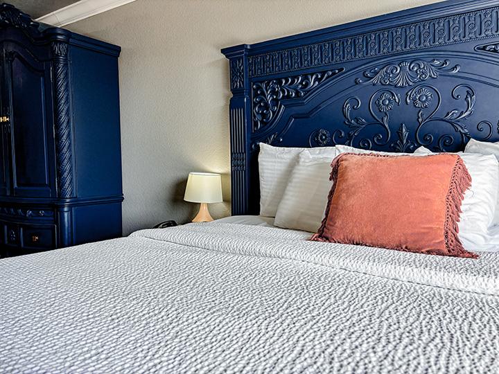 Bed in the Blush Honeymoon Suite at Metropolis Resort