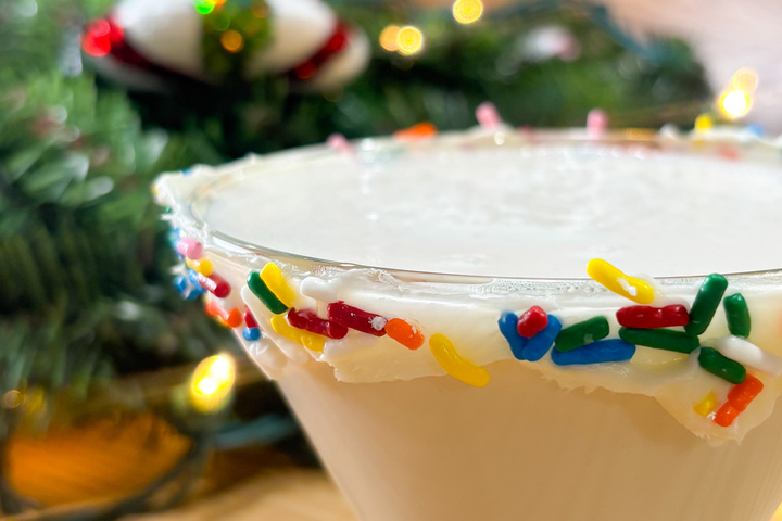 City Eats Mai Tai cocktail with Bacardi Rum, Lime Juice, Grand Mariner, Amaretto, topped with a Myers reserve dark rum float, garnished with a lime wedge, cherry, and mint leaf.