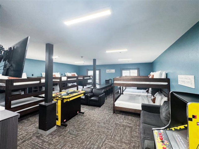 A family in the Bunk House Room at Action City