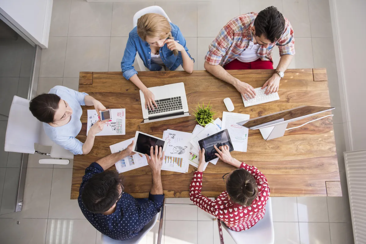 group of people collaborating around a table