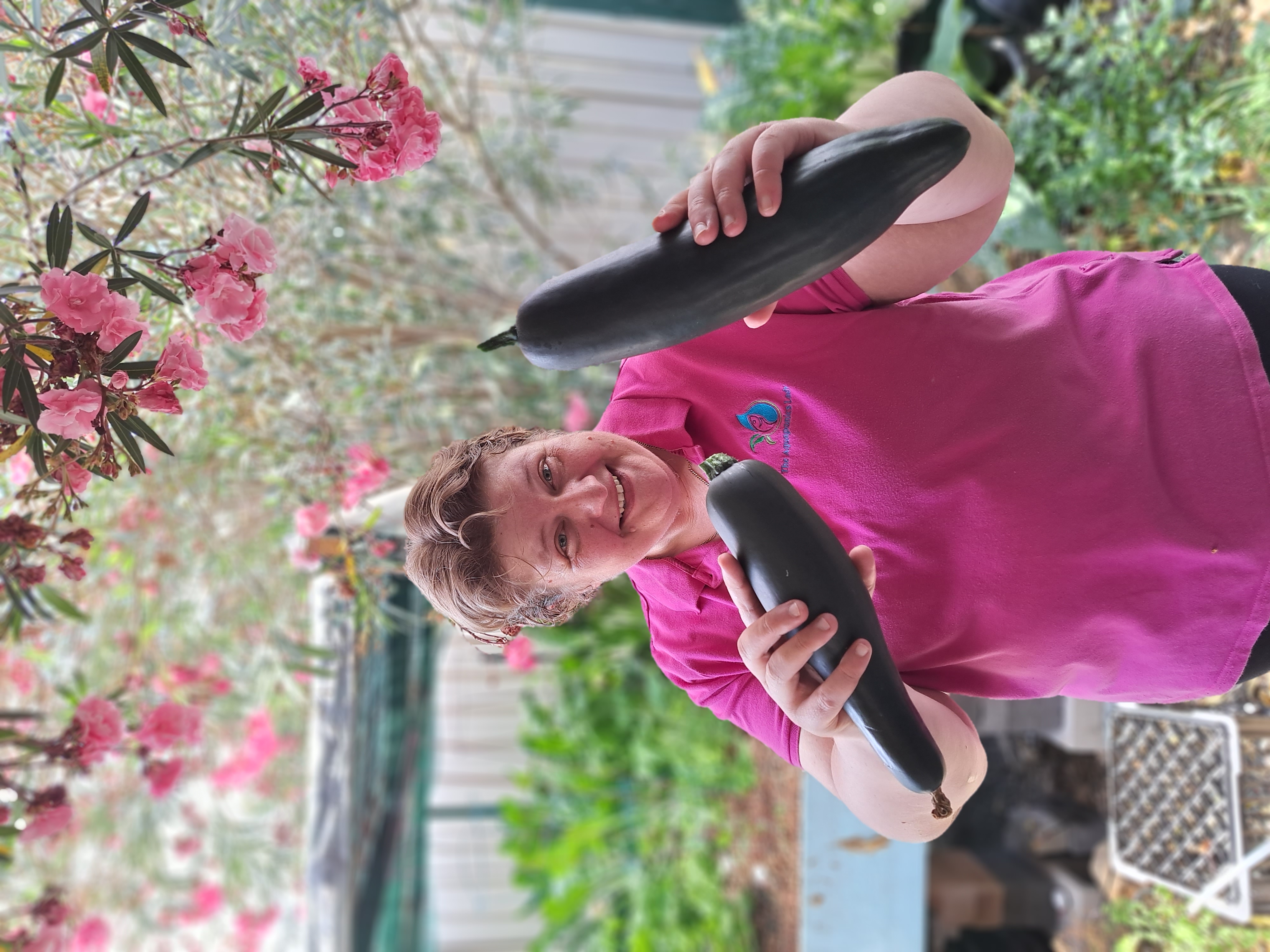 Candy The Aquaponics Lady with a home aquaponics system
