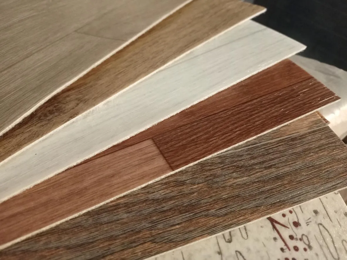 Luxury vinyl plank flooring in waterproof gray wood-look design
