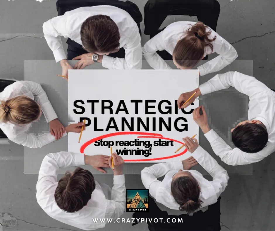 Focused business team collaborating over a table, unlocking the benefits of strategic planning for business through aligned goals and clear direction.