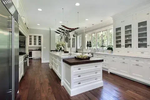 Luxury kitchen remodel with hardwood floors and island by Eden Prairie Remodeling Pros.