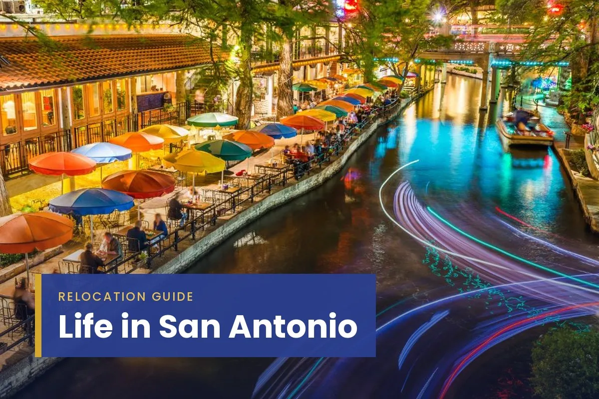 San Antonio River Walk lined with trees and cafes, a guide to moving to San Antonio.