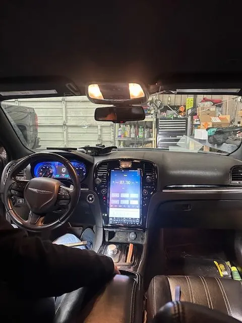 Modern touchscreen head unit installed in vehicle dashboard