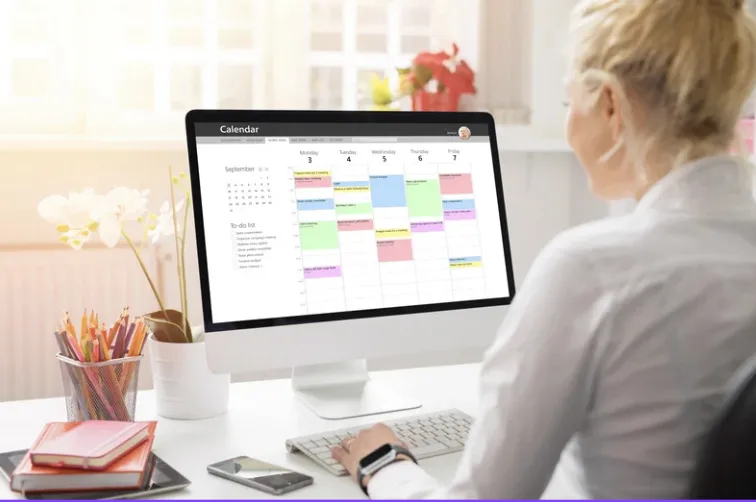 Parent reading calendar in computer