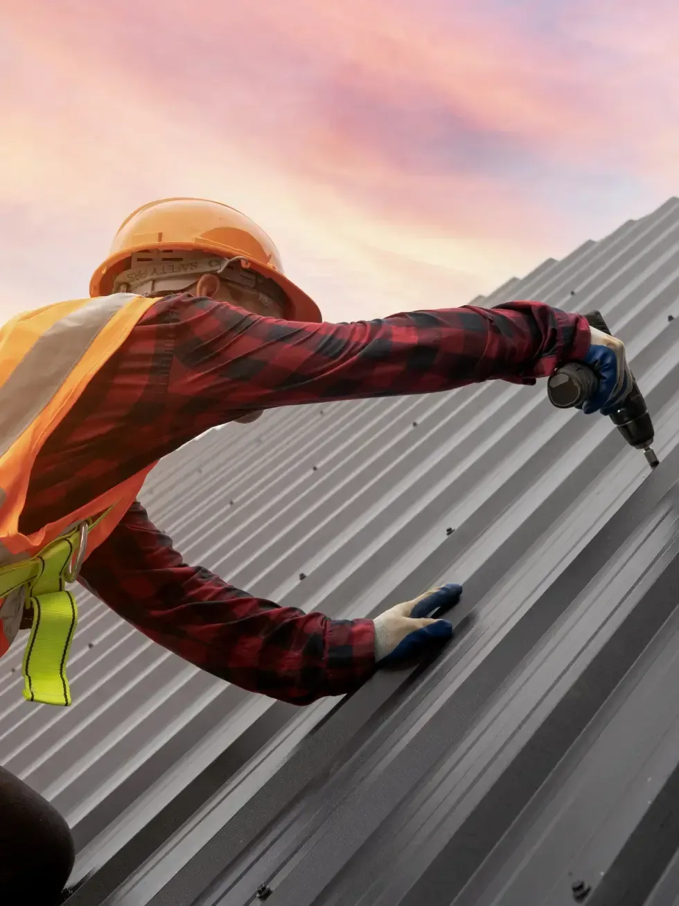 photo of a man fixing roof