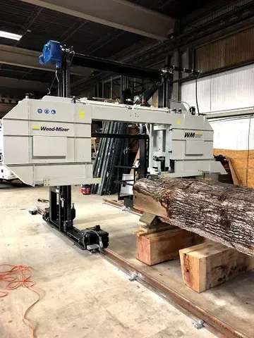 Photo promoting big savings from Riverside Logging and Sawmill, emphasizing the benefits of bypassing middlemen and big box stores to offer customers more cost-effective wood options.
