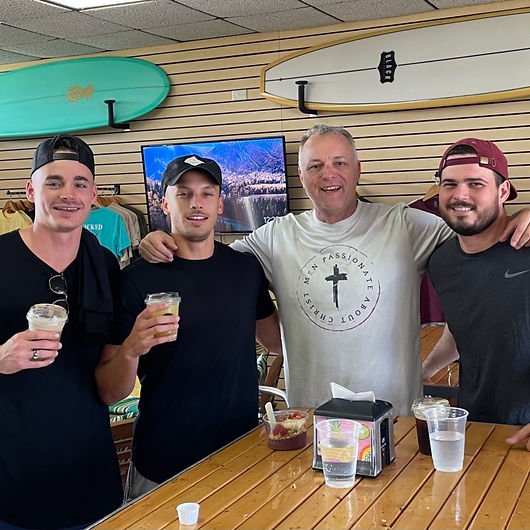 Group of men gathered together in brotherhood at an MPACT Ministries men’s group, building faith, accountability, and community