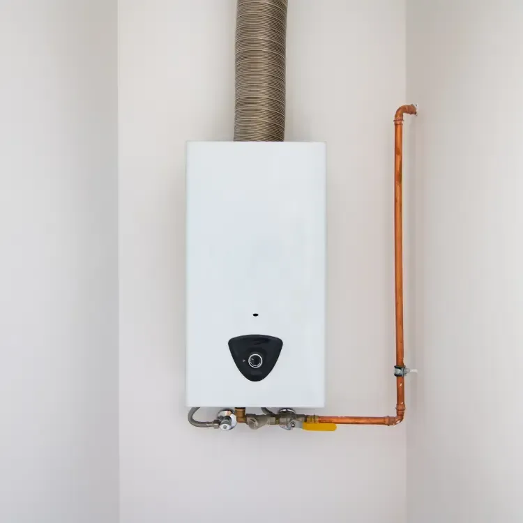 A white tankless water heater.