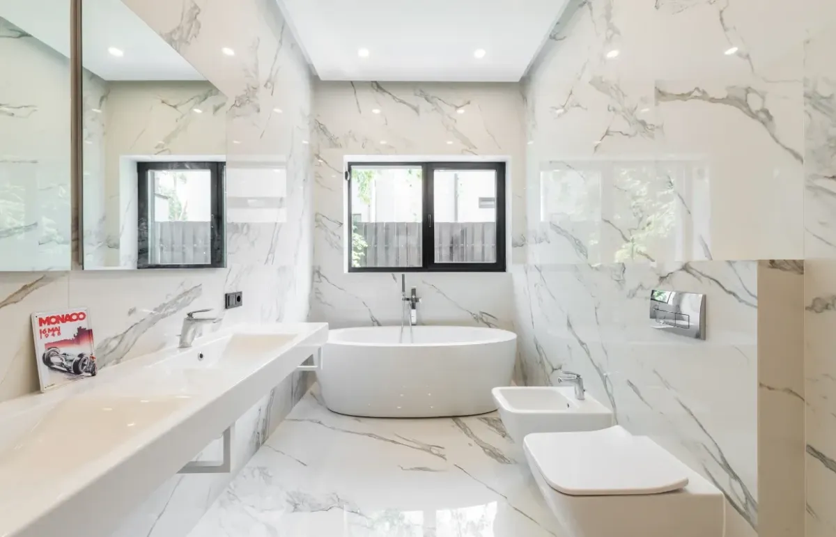 Bathroom shower, countertops, and tiles renovation.
