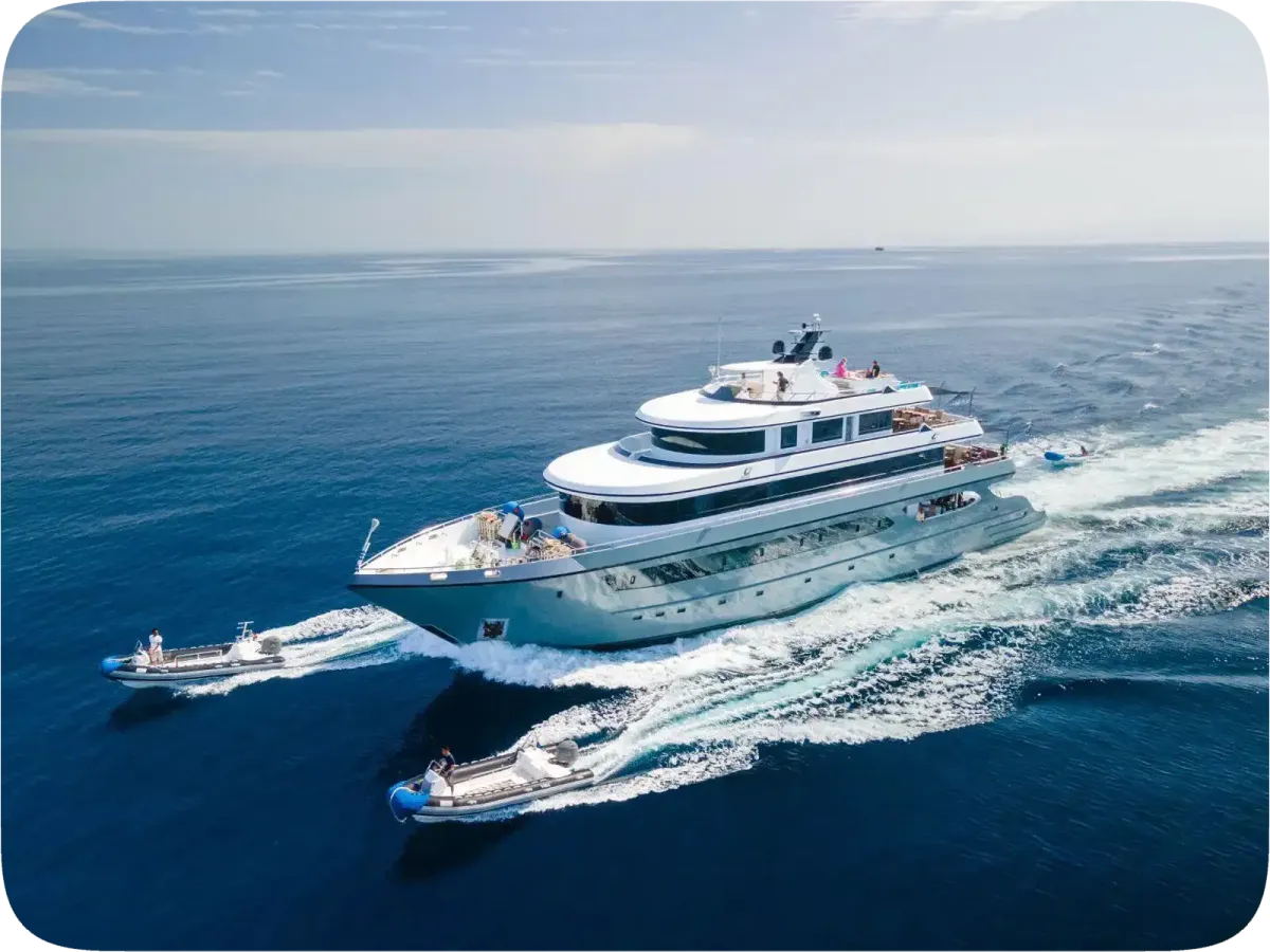 Yacht in the Red Sea with two speedboats