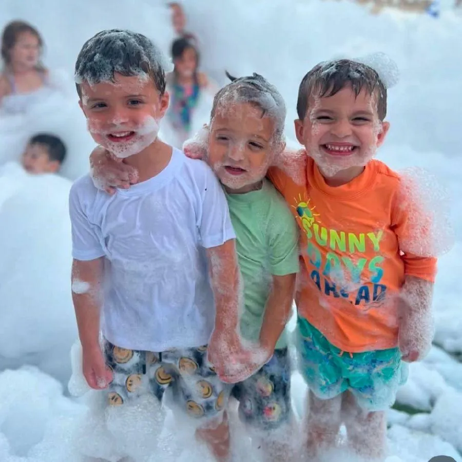 Kids enjoying foam party by Foamin Around