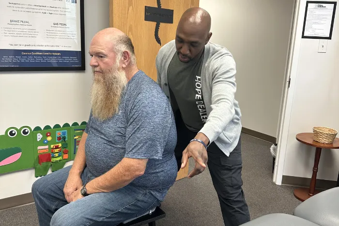 Dr. James Cooley With Patient