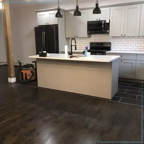 Modern kitchen remodeling in Jersey City, NJ with sleek cabinets.